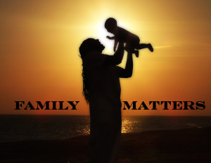 Father baby sunset family matters_text